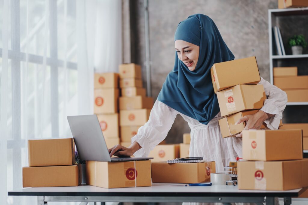 Small Startup Muslim Woman Checking parcels at work, freelancers